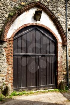 door italy  lombardy     in  the milano old   church   closed brick  pavement