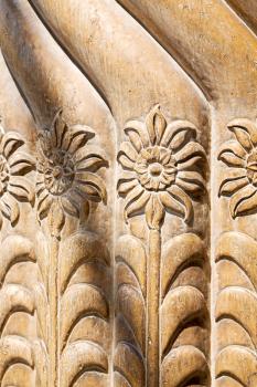 in old iran mousque the column  incision of a flower like abstract background