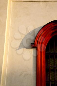  italy  lombardy     in  the barza     old   church   closed brick tower   wall rose   window tile   abstract