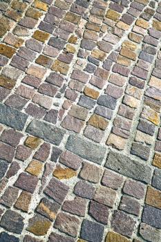 brick in  varano borghi   street lombardy italy  varese abstract   pavement of a curch and marble