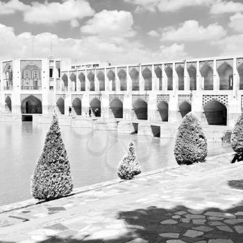 in iran the old bridge and the river antique construction near nature