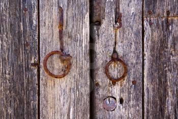 spain knocker lanzarote abstract door wood in the brown 