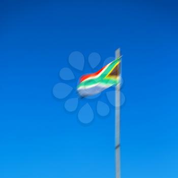 in south africa close up of the blur  national flag on pole
