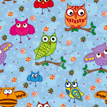 Seamless vector pattern with colorful ornamental owls on a light blue background