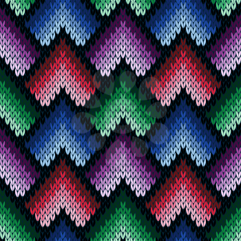 Abstract ornamental knitting seamless vector pattern as a knitted fabric texture in various hues of blue, violet, green and pink colors