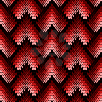 Abstract ornamental knitting seamless vector pattern as a knitted fabric texture with various transition hues of red and pink colors