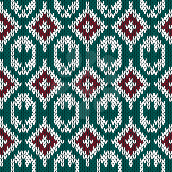 Abstract knitting ornamental seamless vector pattern with rhombus and stylized eagle as a knitted fabric texture in red, green and white colors