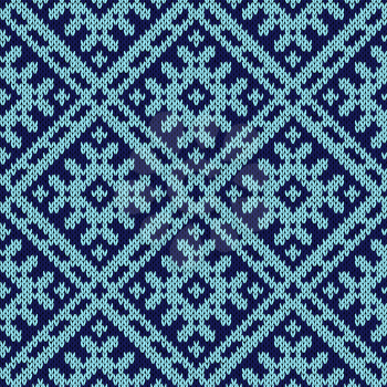 Abstract knitting ornamental seamless vector pattern as a knitted fabric texture in dark and light blue hues