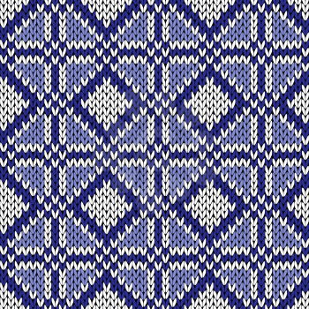 Seamless geometrical knitting vector pattern in blue and white colors as a knitted fabric texture 