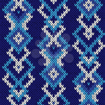 Knitted  winter motif background in various cool blue hues and in white color, seamless knitting vector pattern as a fabric texture