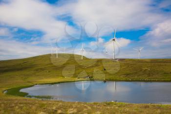 Modern windmills at the edge of world