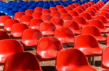 Empty red and blue seats