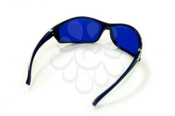 Glasses of saturated blue isolated on the white background. Art edited image