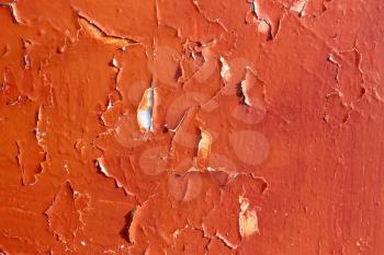Detail of old wooden planks covered with several layers of paint
