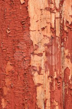 Detail of old wooden boards painted in red