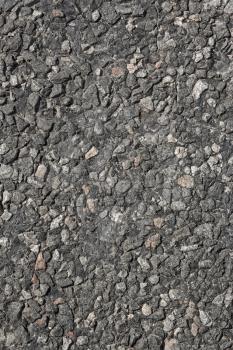 Fragment of asphalt road surface as texture close up 