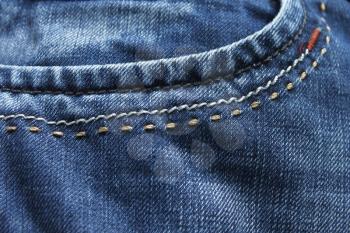 Detail clothes with blue jeans fabric close up