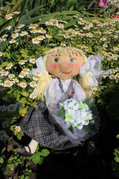 Russian homemade rag doll as symbol of schoolgirl