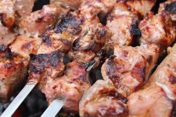Meat porkis fried on the grill skewers at the coals 20465