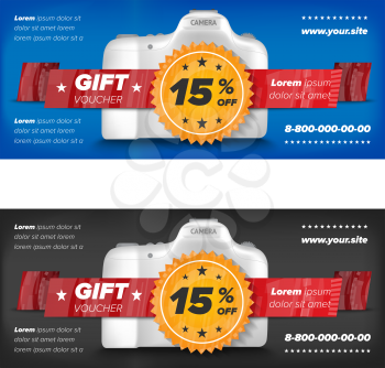 Gift voucher with digital camera placed on abstract colored background