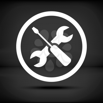White repair icon on a black background with shadow