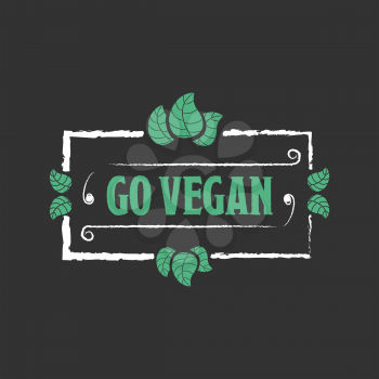 Go vegan Organic food icon with leafs on black background