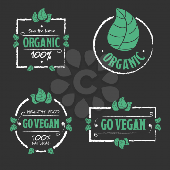 Organic food Go vegan icons set with leafs on black background