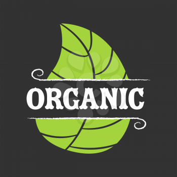 Organic food icon with leafs on black background