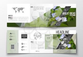 Vector set of tri-fold brochures, square design templates with element of world map and globe. Polygonal floral background, blurred image, blue flowers in green grass closeup, triangular texture