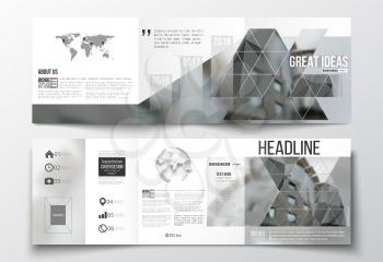 Vector set of tri-fold brochures, square design templates with element of world map and globe. Polygonal background, blurred image, urban landscape, modern stylish triangular vector texture.
