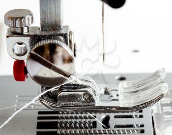 Close-up of modern sewing machine foot