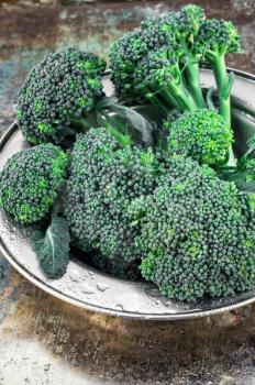 harvest broccoli cauliflower on an iron plate.