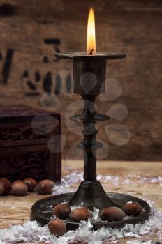 set foto burning Christmas candle in  brass candlesticks