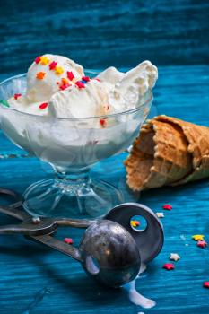 ice cream in  bowl and two waffle cup