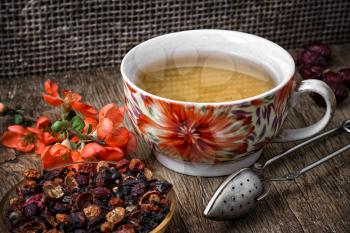 porcelain cup of fragrant tea for medicinal herbs in retro style.Selective focus