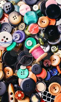Texture of a variety of buttons from clothing.Top view