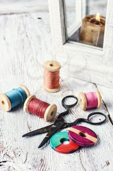 Creative set of two beads,scissors and threads for needlework