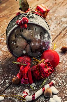 Christmas composition with vintage alarm clock and Christmas decorations