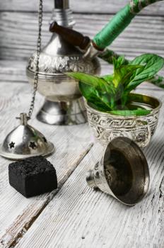 Stylish metal Arabic hookah with mint flavor
