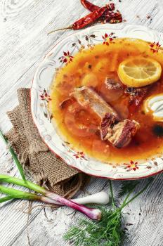 National Ukrainian dish is soup with smoked meat and lemon