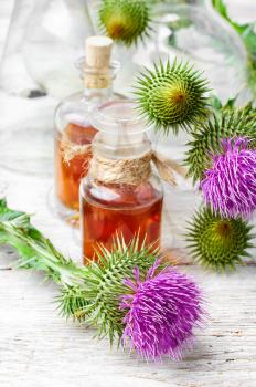 Glass vial with therapeutic drug of the flowering milk Thistle