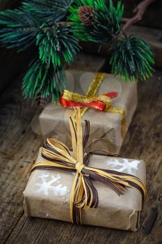 Packed in cardboard boxes tied with ribbon with Christmas gifts