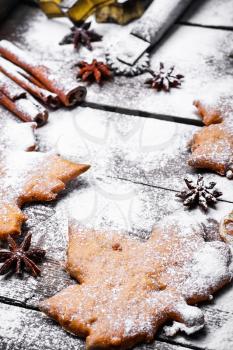 Homemade biscuits in the form of maple leaves covered with snow