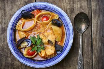 seafood soup with tomato sauce,mussels and pasta
