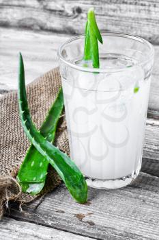 glass of medicinal drink sap from aloe leaf