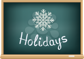 Text message on the school blackboard that represent the winter holidays