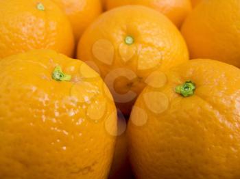 Agricultural background; a pile of beautiful oranges