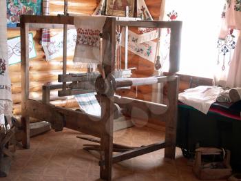 Interior in the ancient house, the typical Ukrainian weaving loom