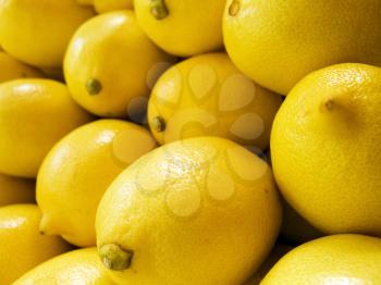 The beautiful yellow lemons on a counter