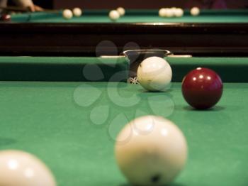 The billiard balls, on a billiards club background